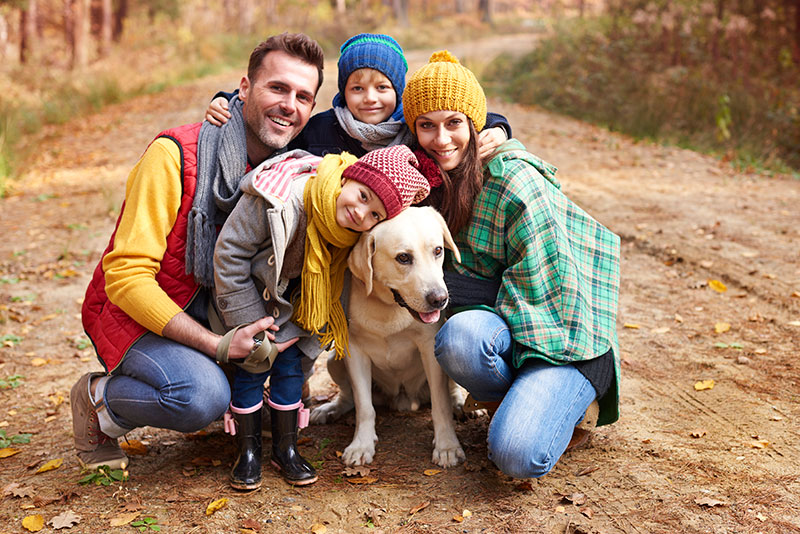 Healthy family hiking outdoors